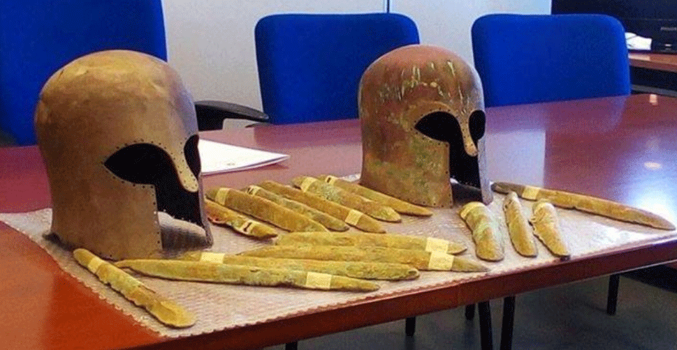 Two Corinthian helmets and 47 ingots were found at the site of a shipwreck off the coast of Sicily. Photo Credit: TANN.