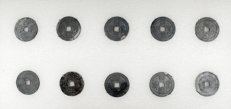 Numerous coins were found at the site. Photo Credit: Chinese Museums Association Exhibition Exchange Platform.