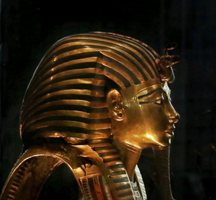 In this Oct. 30, 2013 photo, the solid gold mask of King Tutankhamun is seen in its glass case, in the Egyptian Museum near Tahrir Square in Cairo, Egypt. (AP Photo/Nariman El-Mofty)

