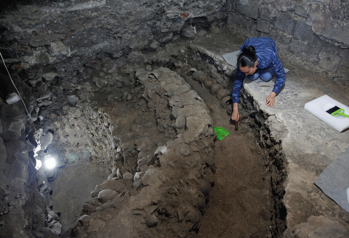 Lorena Vazquez, an archaeologist, works at the site near Templo Mayor.
Photo Credit: Henry Romero/Reuters/The Guardian.