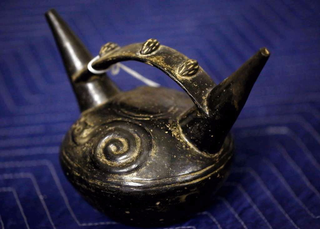 An artefact that was determined to be a forgery of a double sprout stirrup vessel from Northern Peru from 1000-1400 C.E. pictured at The Mexican Museum. Photo Credit: Leah Millis, The Chronicle/SF Gate.