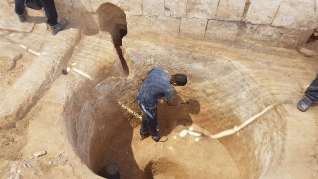 Digging in the ancient 1,600-year-old wine press in Ramat Negev, summer 2017. Photo Credit: Tali Gini, IAA/Times of Israel.