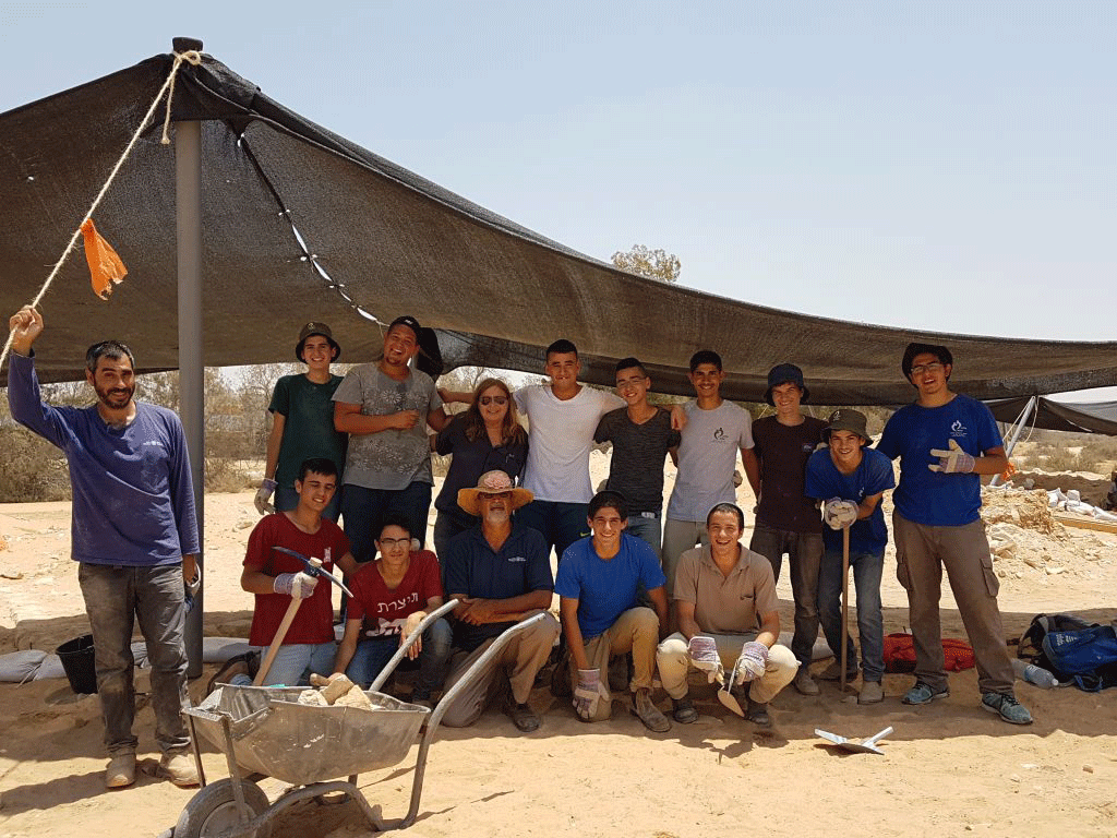 Youth participated in the Ramat Negev wine press dig alongside archaeologists, summer 2017. Photo Credit: Orit Afflalo, IAA/Times of Israel.
