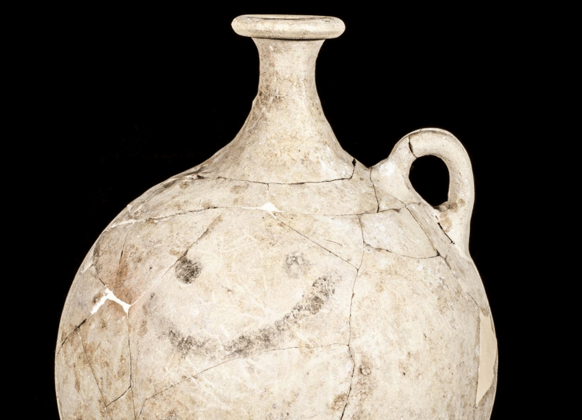 Detail of the pitcher showing hte smiley face. Photo Credit: Turco-Italian Archaeological Expedition at Karkemish/The History Blog.