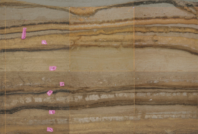 The stratigraphy of the sea cave in Sumatra excavated by scientists from the Earth Observatory of Singapore, Rutgers, and other institutions shows lighter bands of sand deposited by tsunamis over a period of 5,000 years and darker bands of organic material, largely consisting of bat guano. Photo Credit: Earth Observatory of Singapore/Seeker.