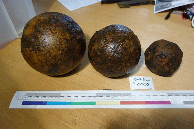 Cannon balls discovered as part of the dredging operation.. Photo Credit: Isle of Wight County Press.