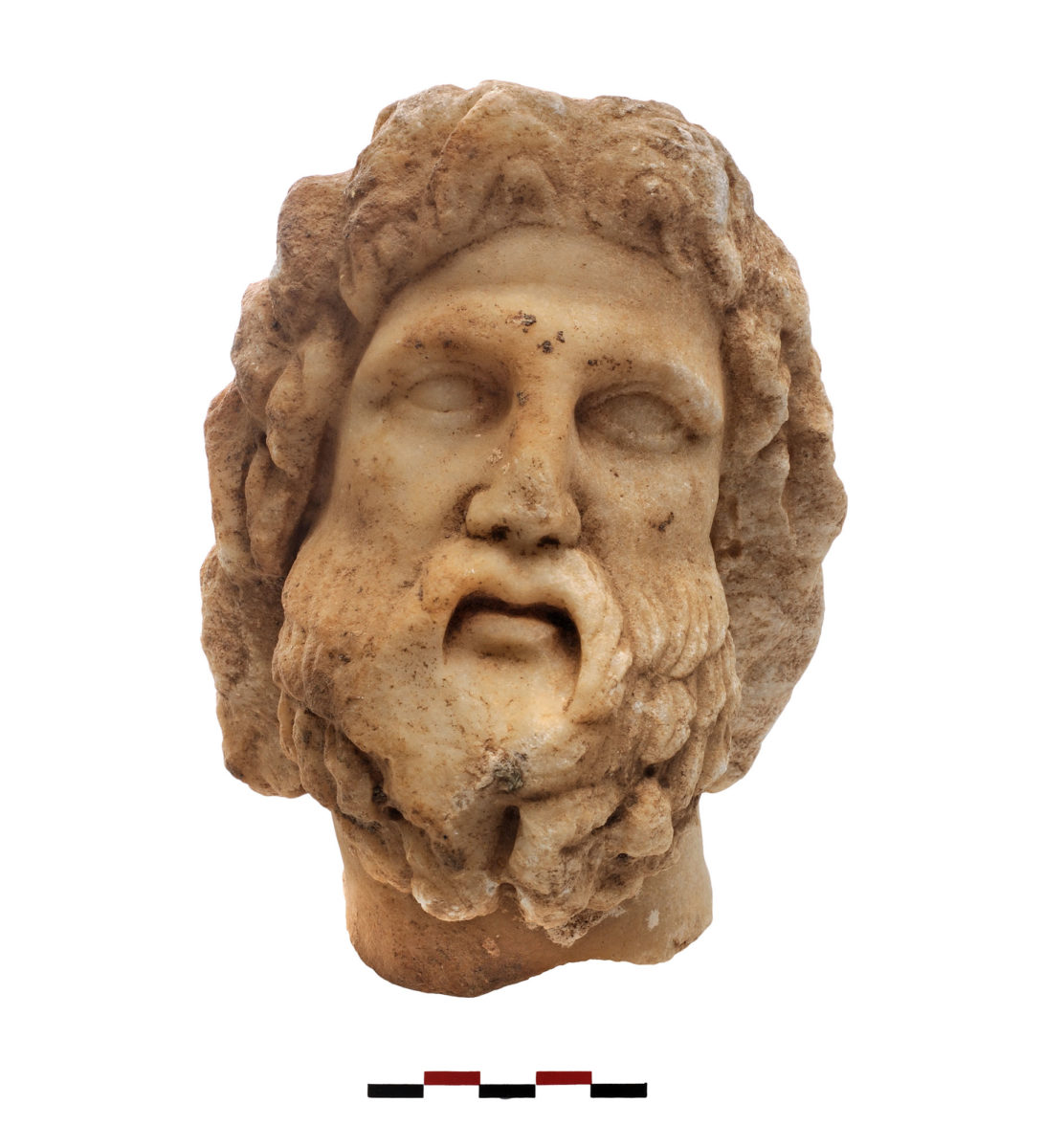 Fig. 11. Head of a bearded figure (Asclepius or Serapes). Photo Credit: Kostas Xenikakis.