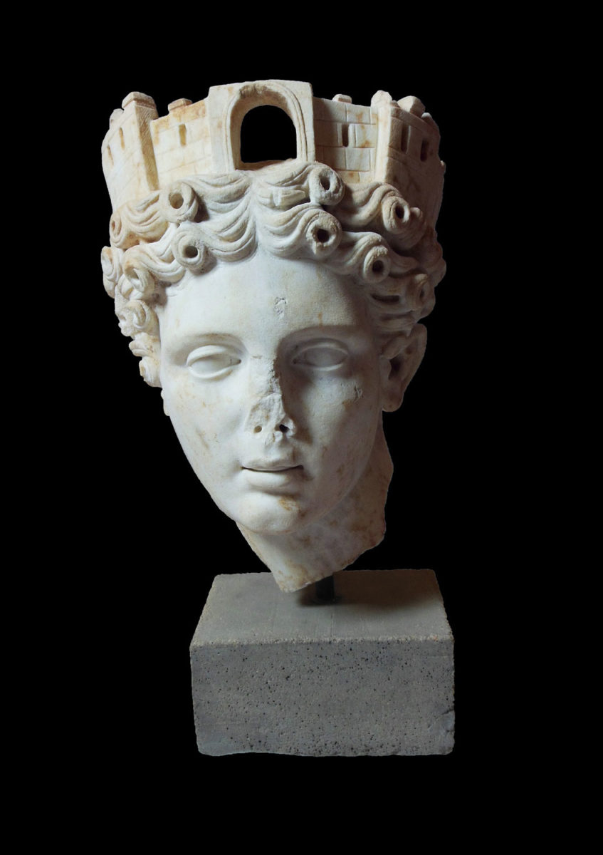 Marble head of tower-crowned Tyche. End of 1st c. AD. © Archaeological Museum of Ancient Corinth (photographic archive of the Ephorate of Antiquities of Corinthia).