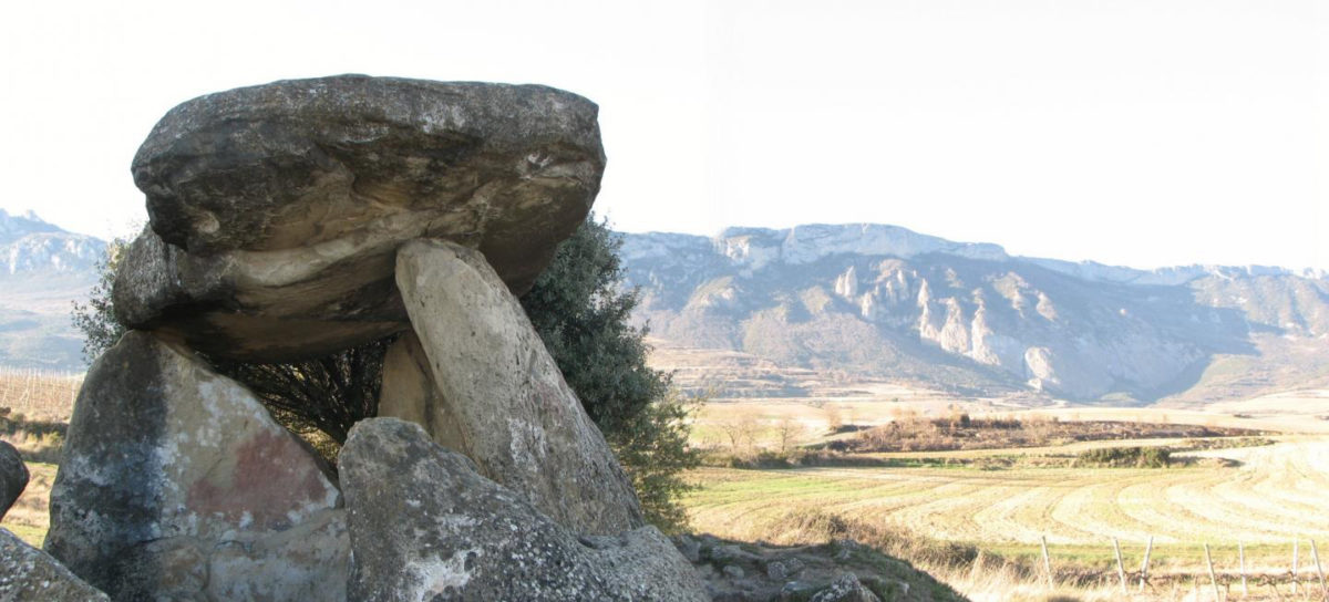 One of the dolmens analysed, located in Elvillar (Araba). In the background, the Cantabria mountain ridge, where the caves included in the study are located. Credit: Teresa Fernández-Crespo / UPV/EHU