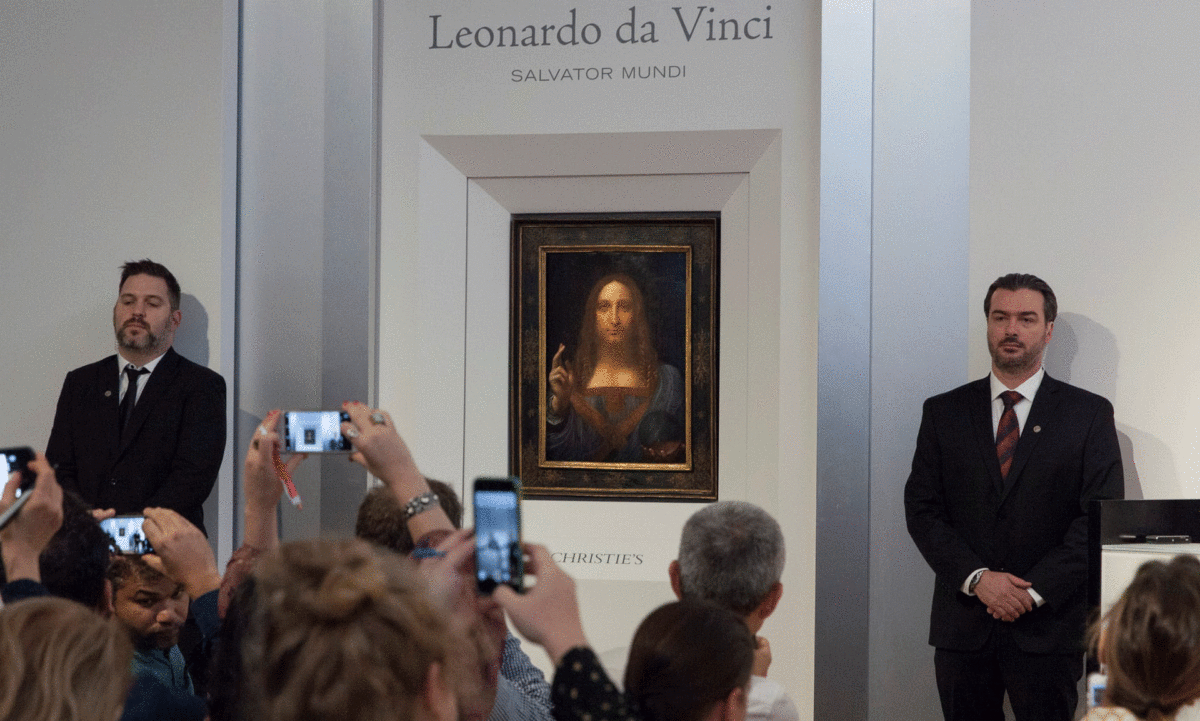  Salvator Mundi is unveiled at Christie’s in New York. Photo Credit: The Guardian/Reuters.