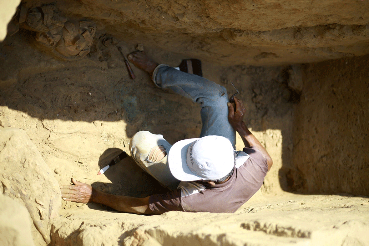 A worker is seen at an archaeological site at Huaca de la Cruz in the Pomac Forest Historic Sanctuary, in Lambayeque, Peru. Photo Credit: Pierre Cobos/Reuters/IB Times.