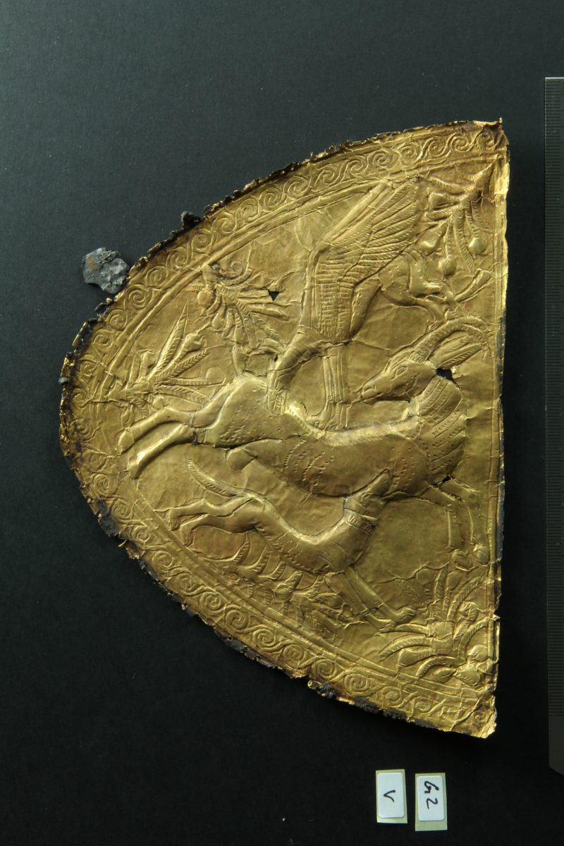 Embossed gold application with motif of animal combat of Levantine origin. Photographer: Christian Eckmann; Copyright: RGZM, DAI Cairo and University of Tübingen