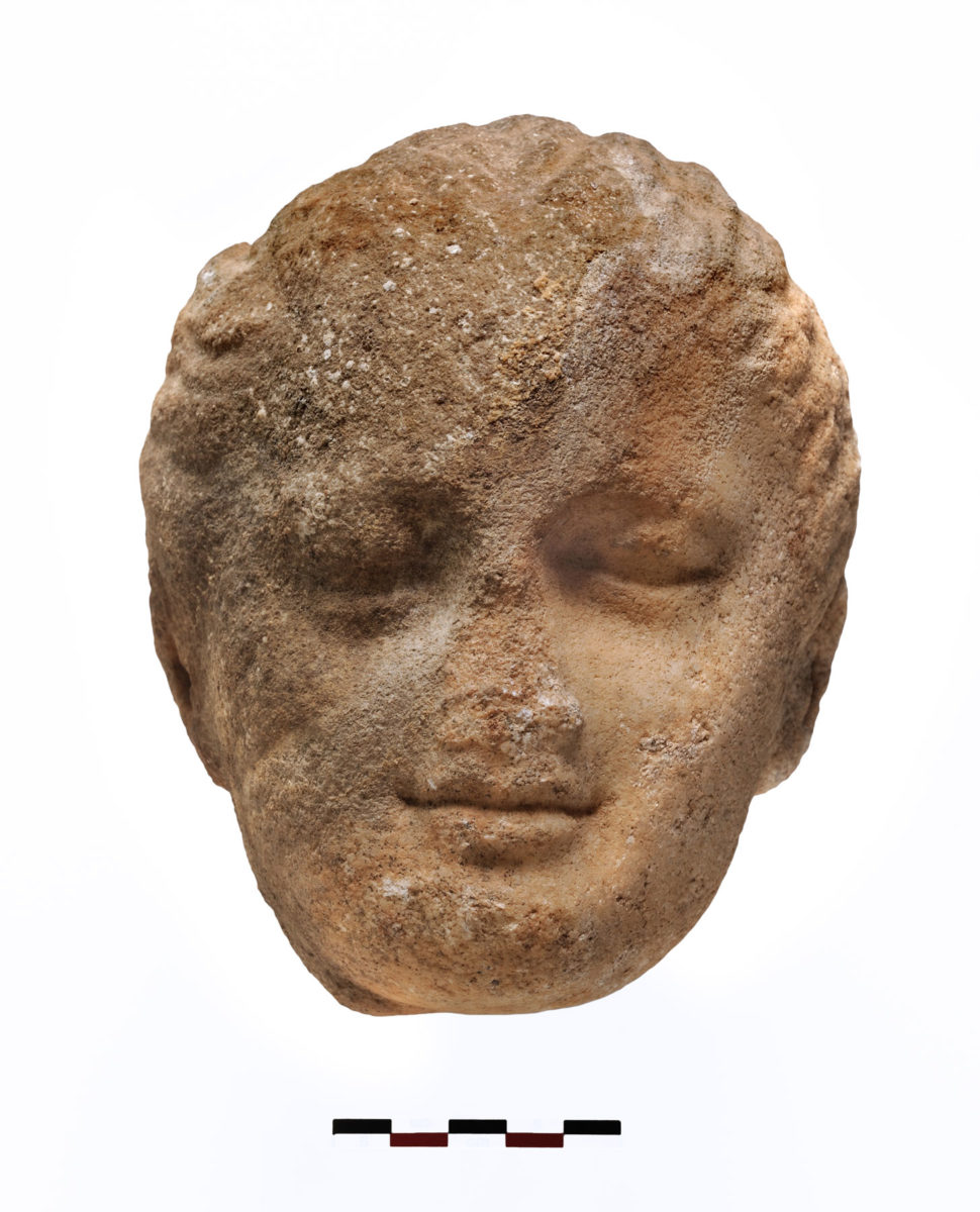 Marble head of a girl from inside the cistern (photo: Kostas Xenikakis). 