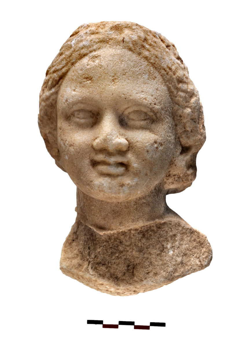 Marble head of a girl from inside the cistern (photo: Kostas Xenikakis). 