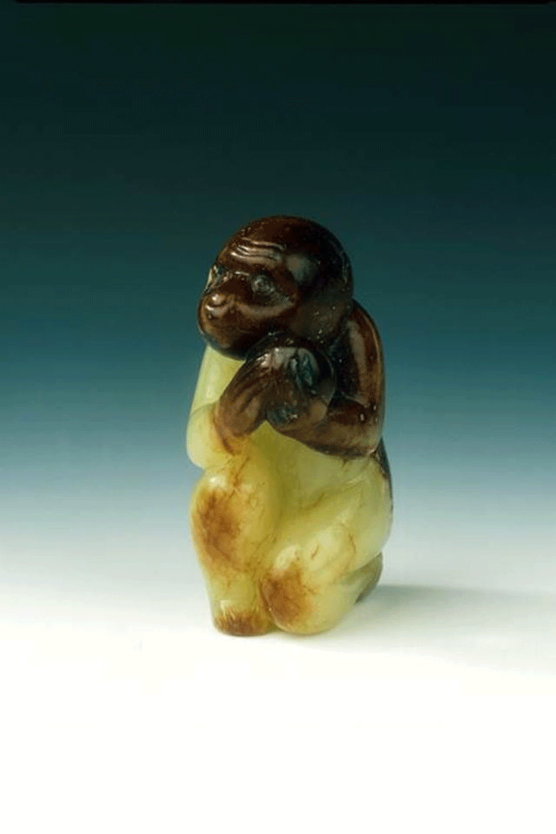 Another stolen item was this jade monkey holding a peach (13th-15th century). Photo Credit: The Art Newspaper/Avon and Somerset Police.
