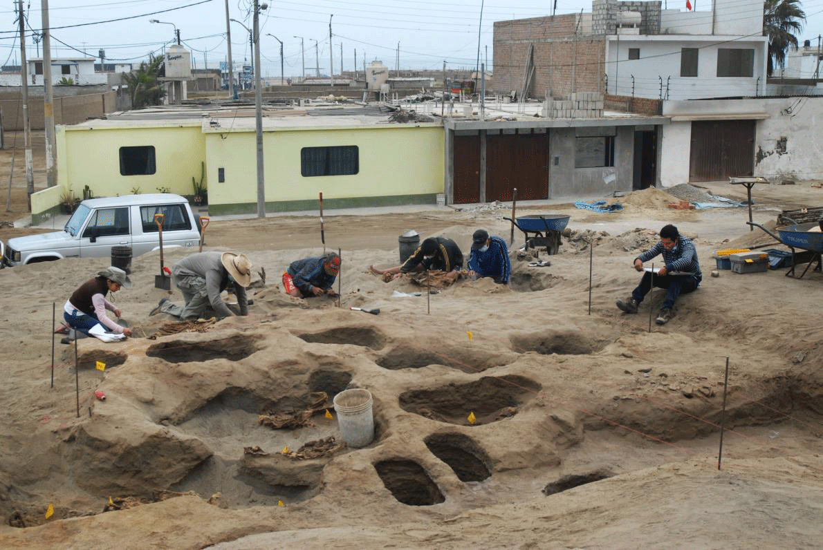 Archaeologist Gabriel Prieto, second from left, a National Geographic Explorer, excavates the coastal lot where the ritual event took place more than 500 years ago. He trains local students to become the next generation of scientists to document the history of Huanchaco. Photo Credit: Gabriel Pietro/John Verano/National Geographic.