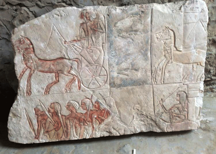 One of the wall paintings depicts an infantry unit and charioteers crossing a waterway with crocodiles, probably representing the eastern borders of Egypt. Photo Credit: Luxor Times.