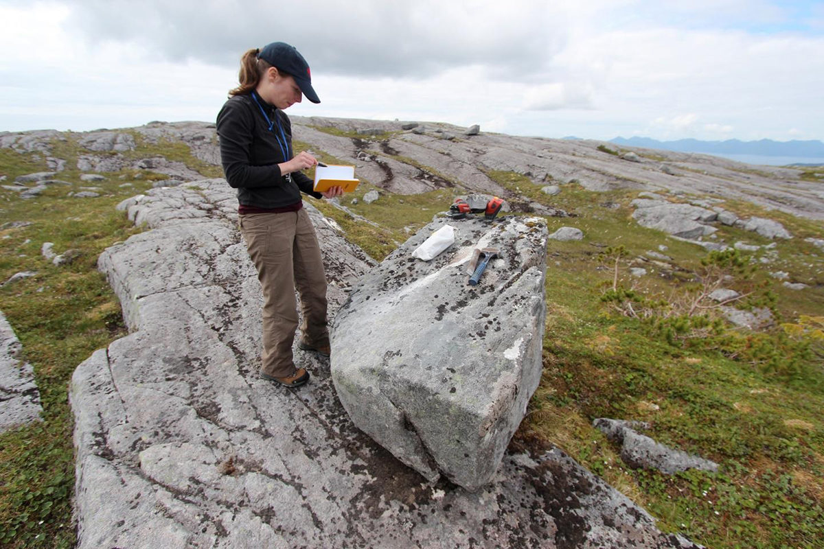 University at Buffalo Ph.D. candidate Alia Lesnek works at Suemez Island – Credit: Jason Briner