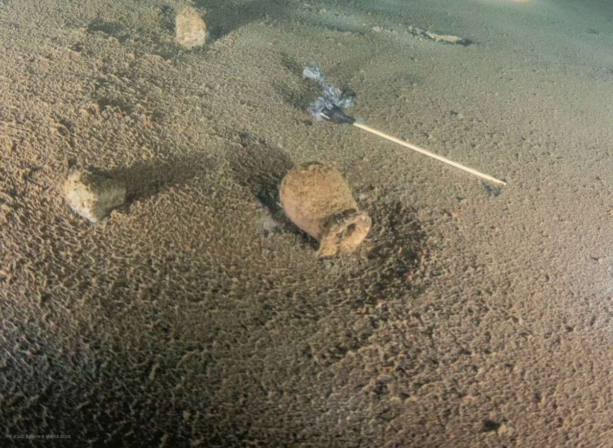 Divers found a hand grenade probably made of ceramic. Photo Credit: Kirill Egorov / Ocean Discovery / Mars Project / Nordic Science.