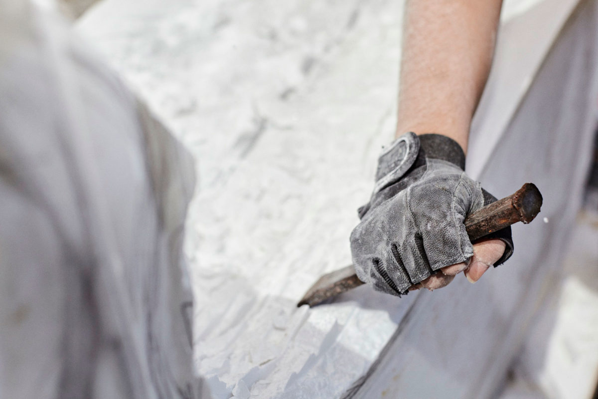 Marble being chiseled during workshops of the 1st Sculpture Symposium © PIOP, photo: George Vdokakis.