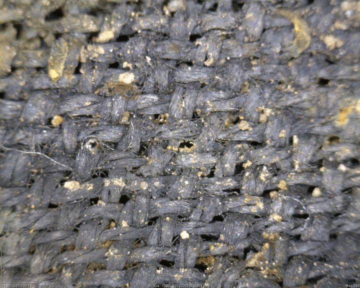 A micrograph of the spliced textile from Over barrow, Cambridgeshire. Image Credit: M. Gleba, S. Harris, with permission of Cambridge Archaeological Unit.