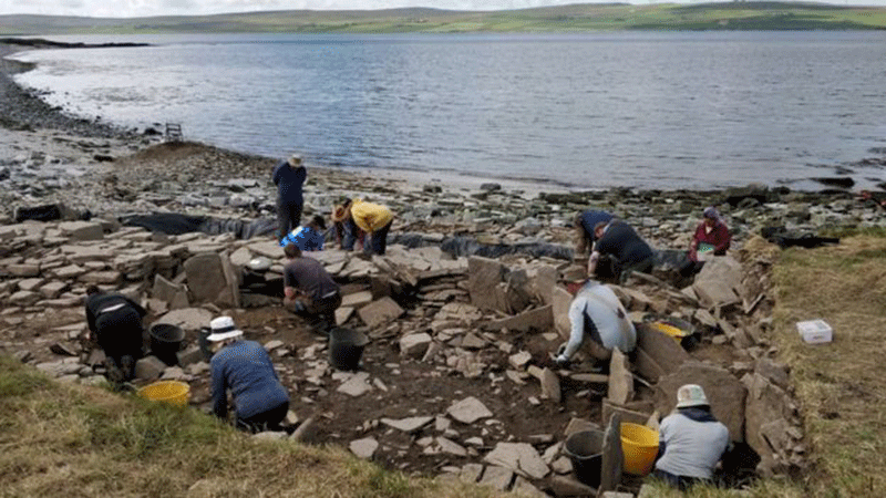 Archaeologists are racing to excavate the Swandro site before it is eroded by the sea. Photo Credit: BBC.