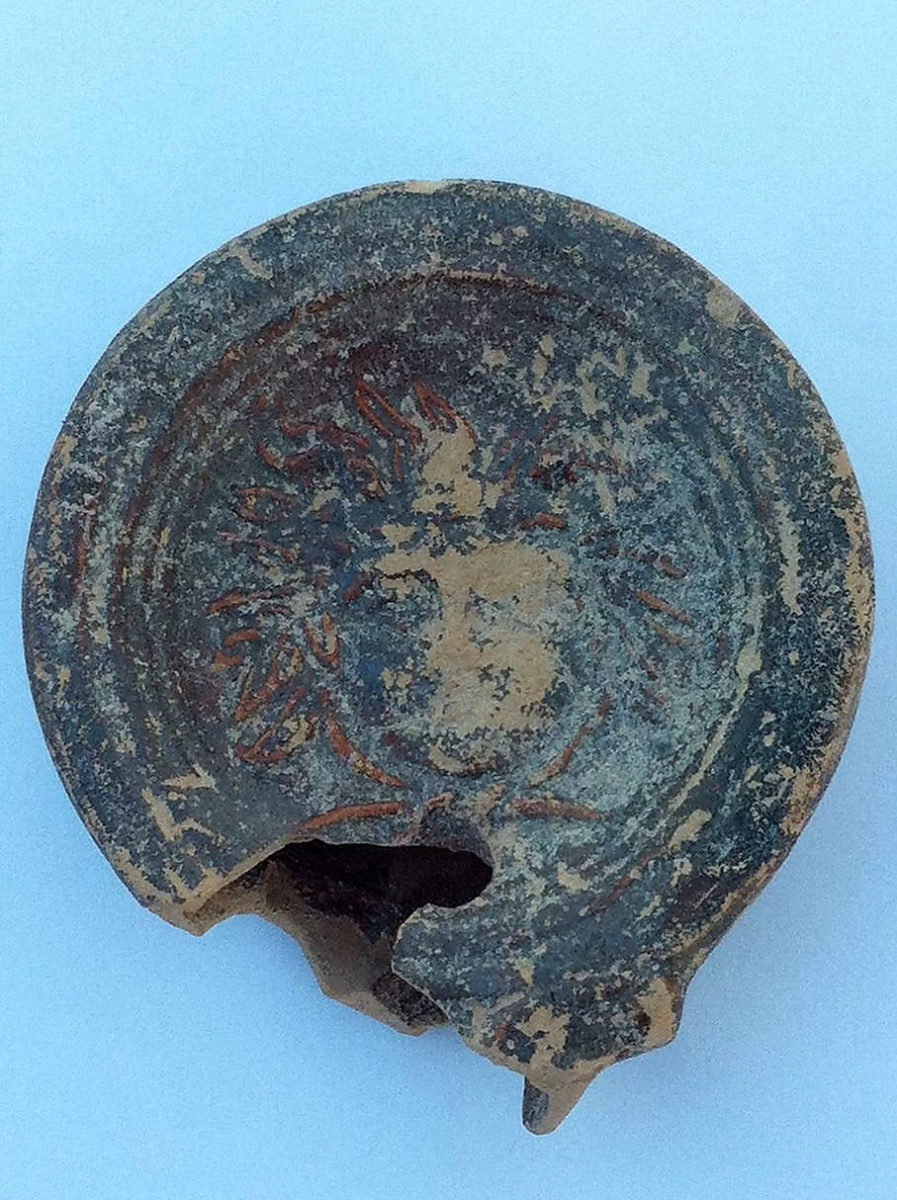 Pafos-Toumballos: Among these finds a lamp adorned with a head with wavy hair is worth mentioning. 
