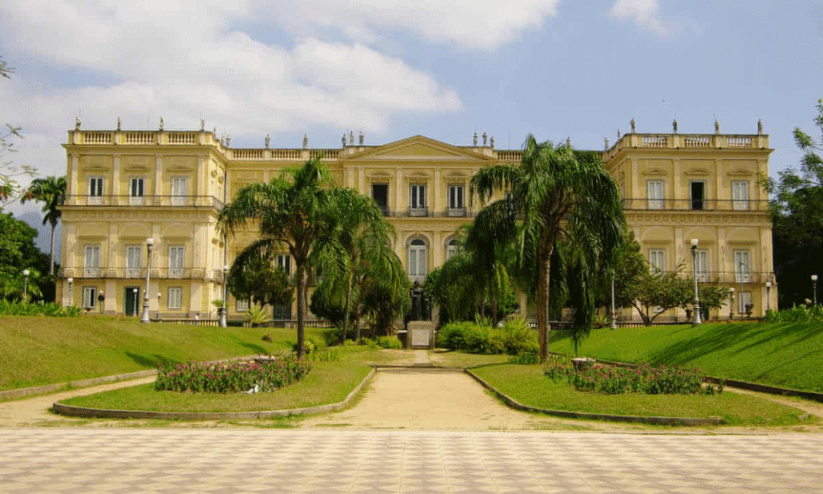 The National Museum facade, in the middle of the park Quinta da Boa Vista, Rio de Janeiro. Photo Credit: Alamy/The Guardian.