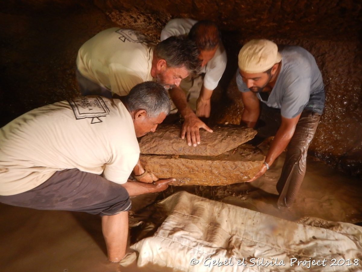The team (l-r: Ibrahim, John, Ali, Ahmed) prepare one of the child sarcophagi to be lifted.