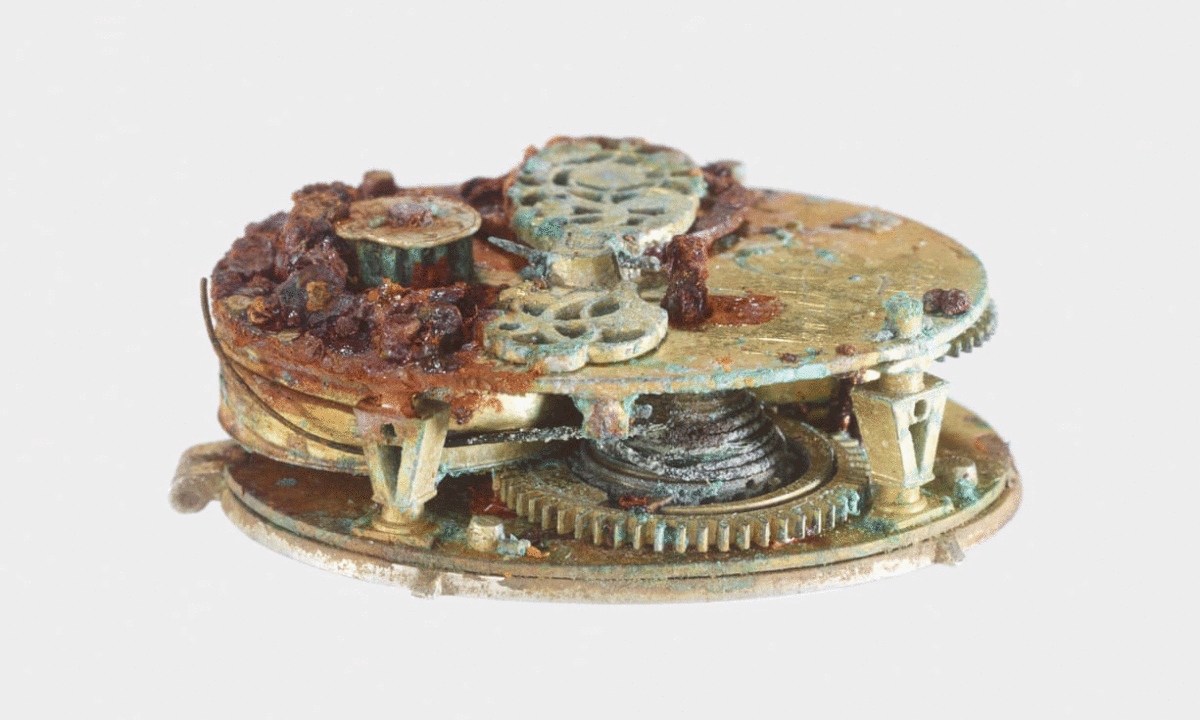 The inside mechanism of a post-medieval silver pocket watch found in Buckinghamshire. Photo Credit: Trustees of the British Museum/PA/The Guardian.