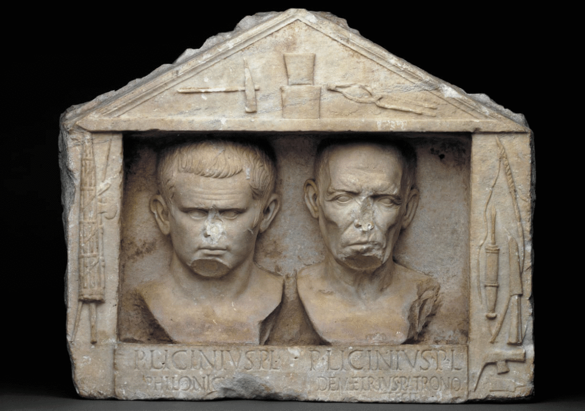 Marble relief depicting Publius Licinius Philonicus and Publius Licinius Demetrius. Photo Credit: British Museum/The Guardian.