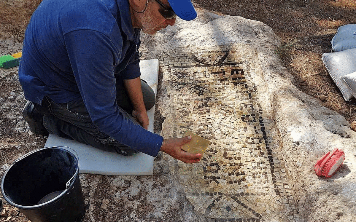 Preservation work on the 1,600-year-old inscription and wine press unearthed at the home of a wealthy Samaritan in Tzur Natan. Photo Credit: Galeb Abu Diab/IAA/Times of Israel.
