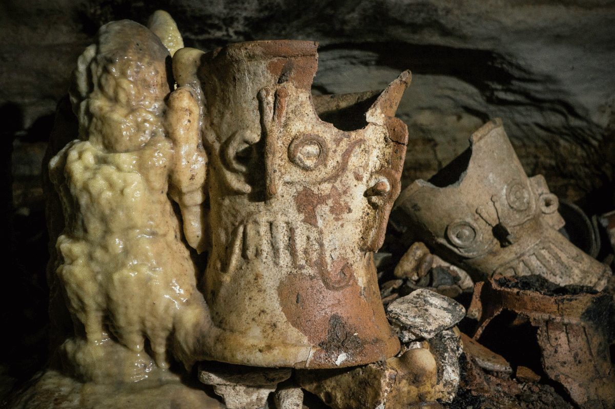 Pre-Columbian artifacts in a cave at the Maya ruins. Photo Credit: Karla Ortega/Mexico's National Institute of Anthropology, via Associated Press/ The NY Times.