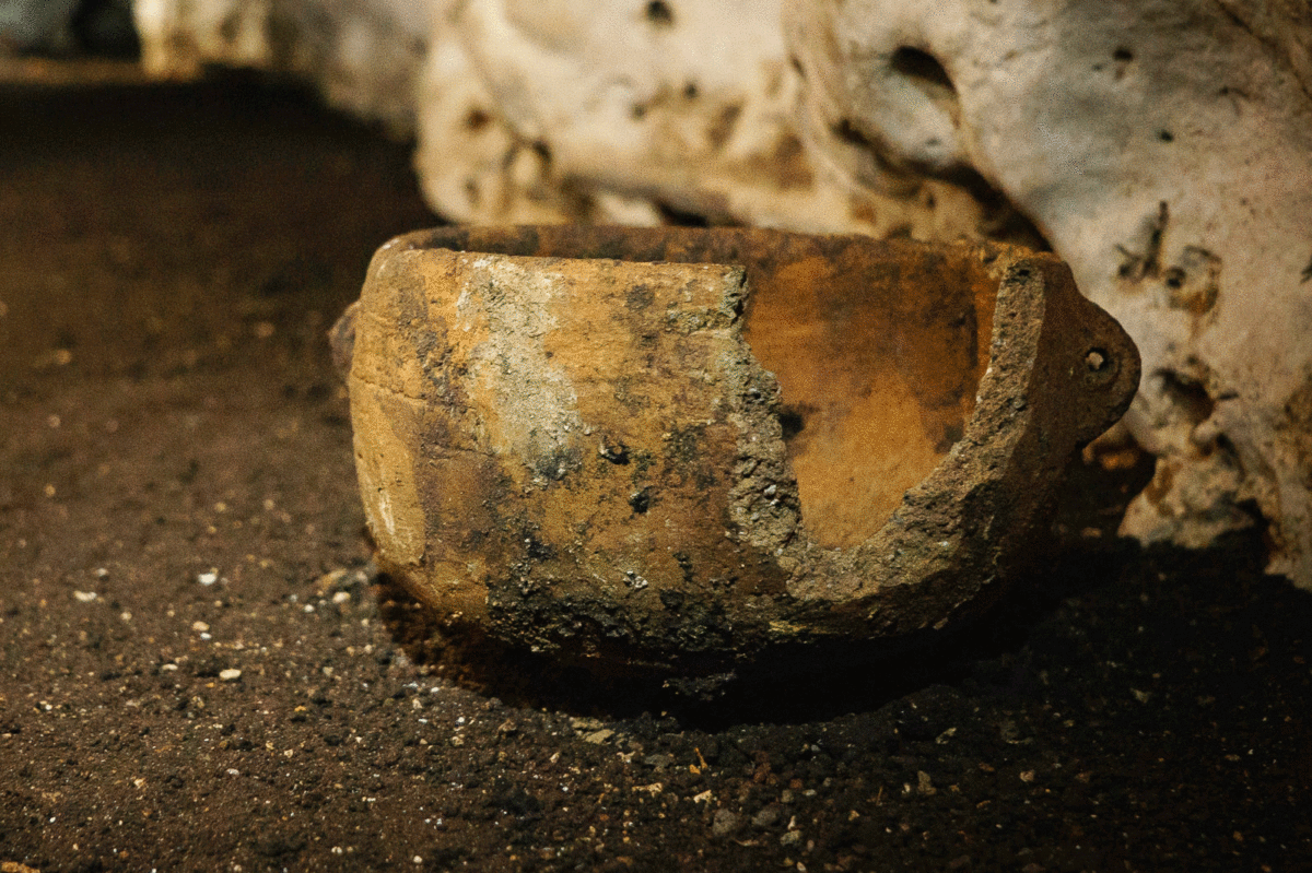 Pre-Columbian artifacts in a cave at the Maya ruins. Photo Credit: Karla Ortega/Mexico's National Institute of Anthropology, via Associated Press/ The NY Times.