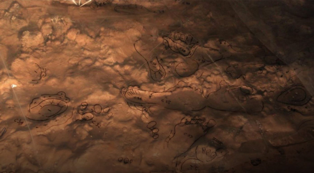 In the cave of Bàsura, a preliminary survey of fossil traces is carried out on glossy sheets as a reference for more detailed analyses. Credit: Isabella Salvador
