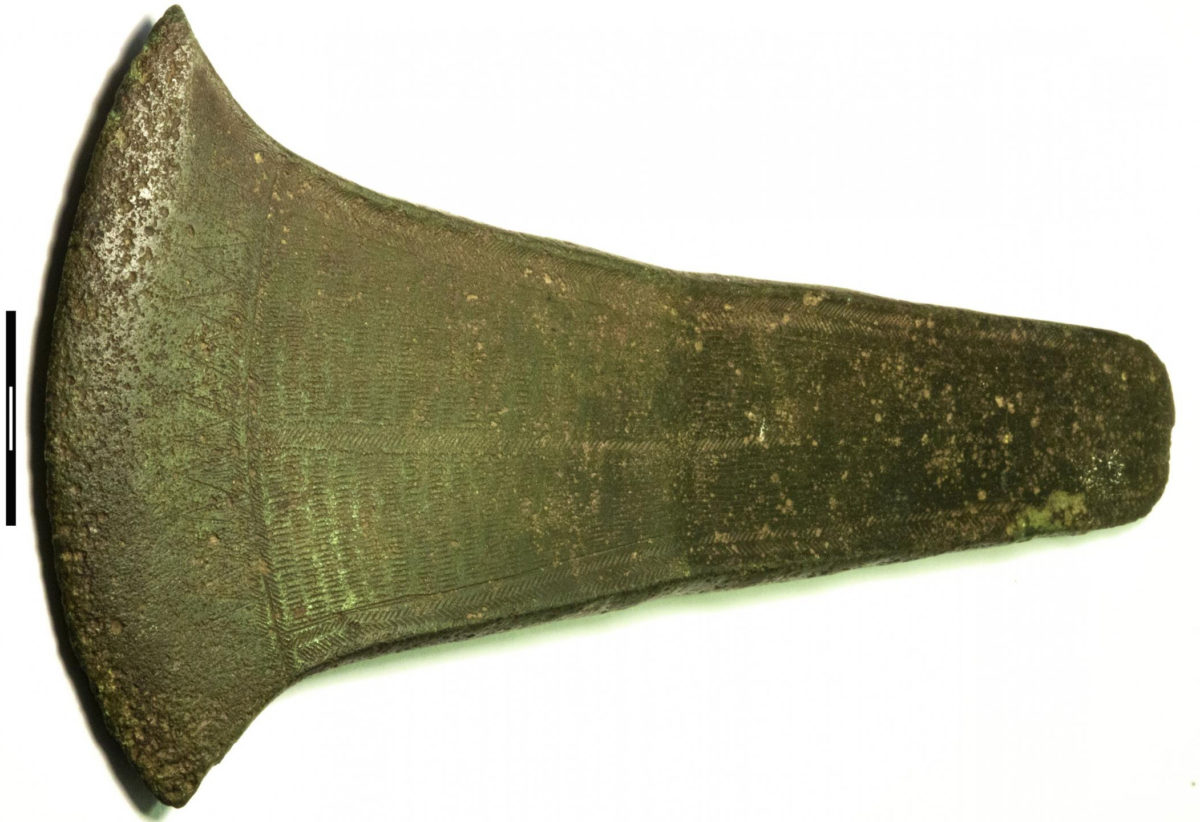British-developed bronze flat-axe from Selchausdal, northwest Zealand (NM B5310, photo: Nørgaard). The 20-cm-long axe has a geometric decoration covering the surface. Low-impurity copper is alloyed with 10% Sn. Scandinavia holds the largest proportion of British type axes outside the British Isles 2000-1700 BC. Credit: 
Heide W. Nørgaard (2019)