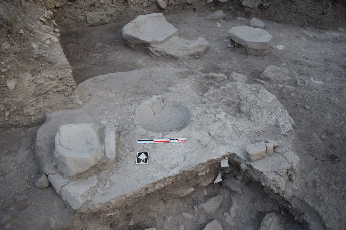 Chalcolithic house with hearth, basin and tools.