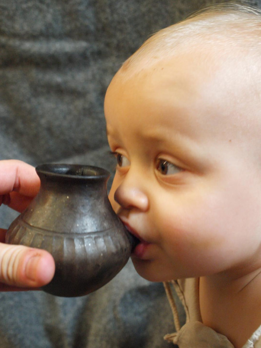 Modern-day baby feeding from reconstructed infant feeding vessel of the type investigated here.
Credit: Helena Seidl da Fonseca