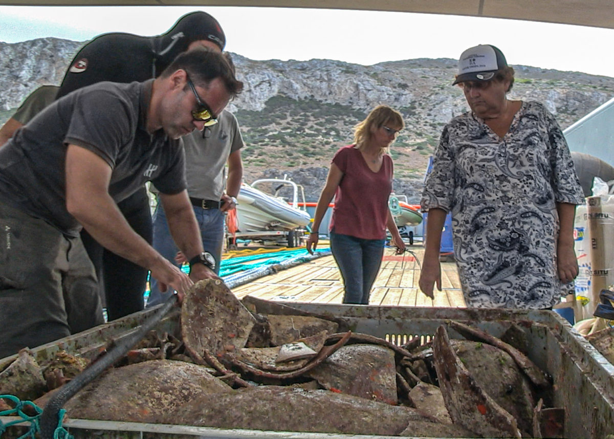 Ceramics from the cargo of the Antikythera shipwreck. They are being lifted onto the deck of the 