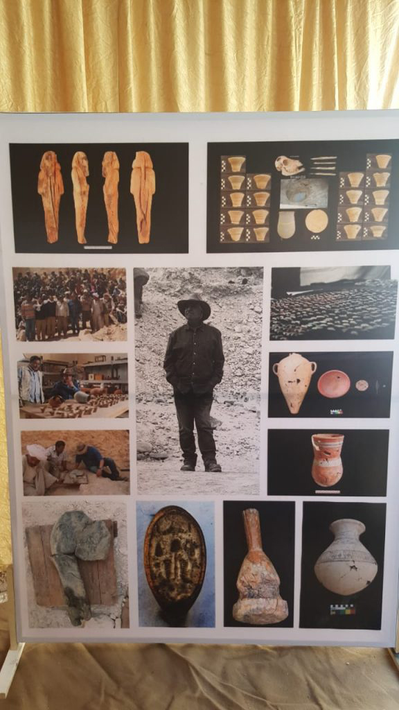 Poster with Dr. Hawass surrounded by the team's most important discoveries.