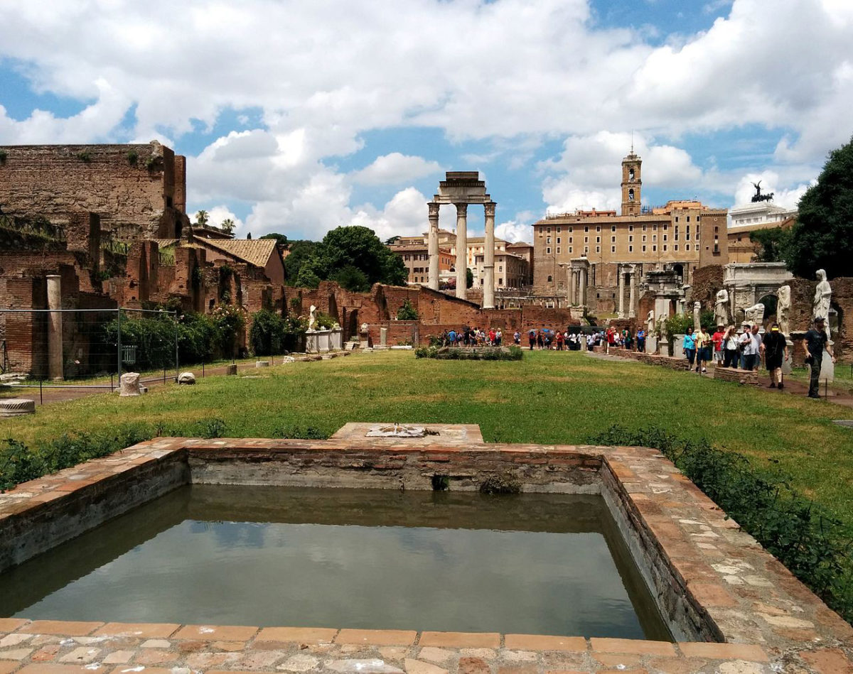 View of the Atrium Vestae. In the background are the columns of the Temple of Castor and Pollux and other structures of the forum.