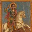St. George on white horse before and after conservation. 