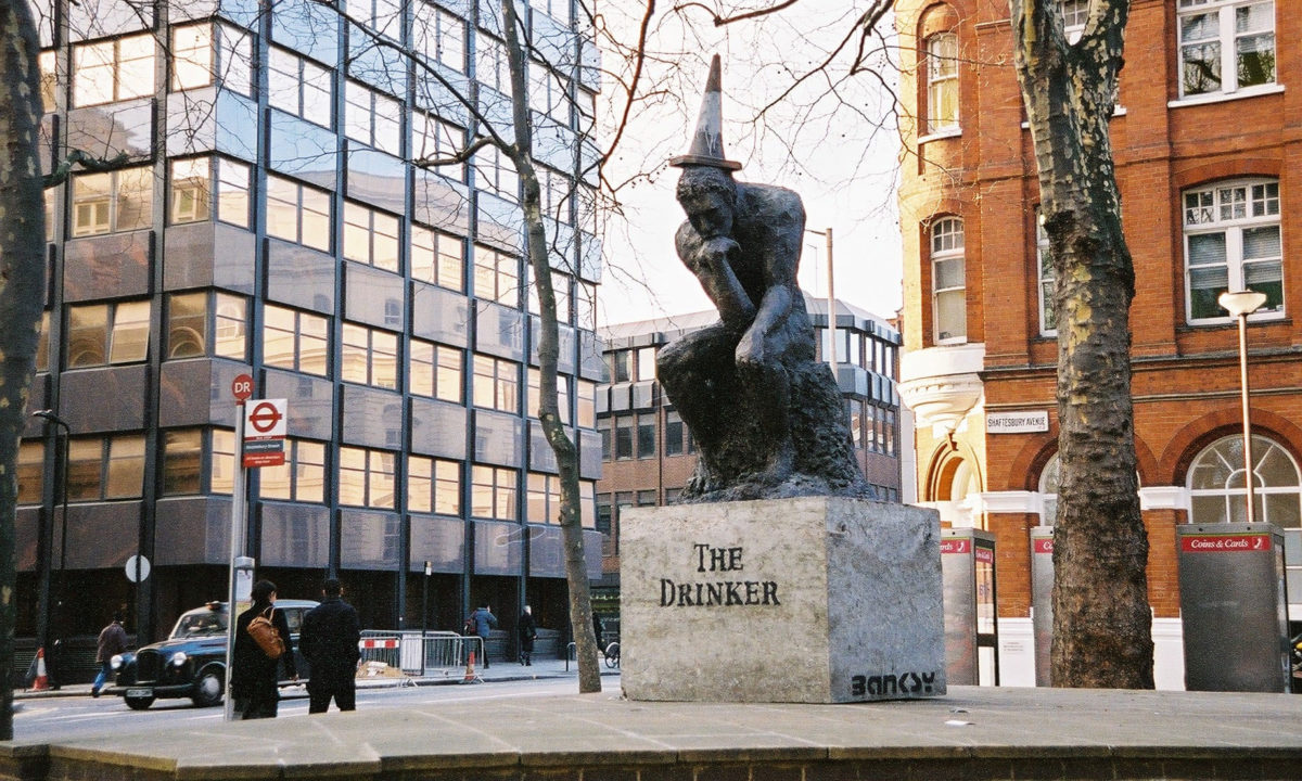 The Drinker, the sculpture by Banksy (photo: The Guardian)