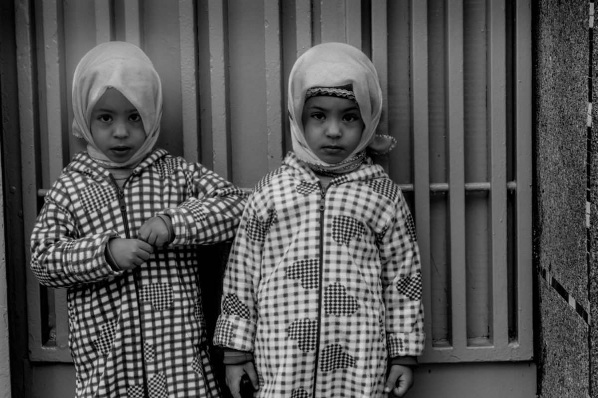 Returning from the hammam with towels around their wet hair.