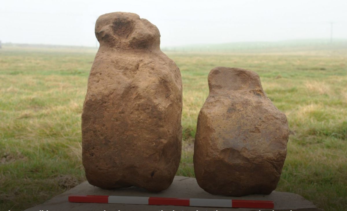 Two of the figurines before cleaning. Credit: ORCA Archaeology.