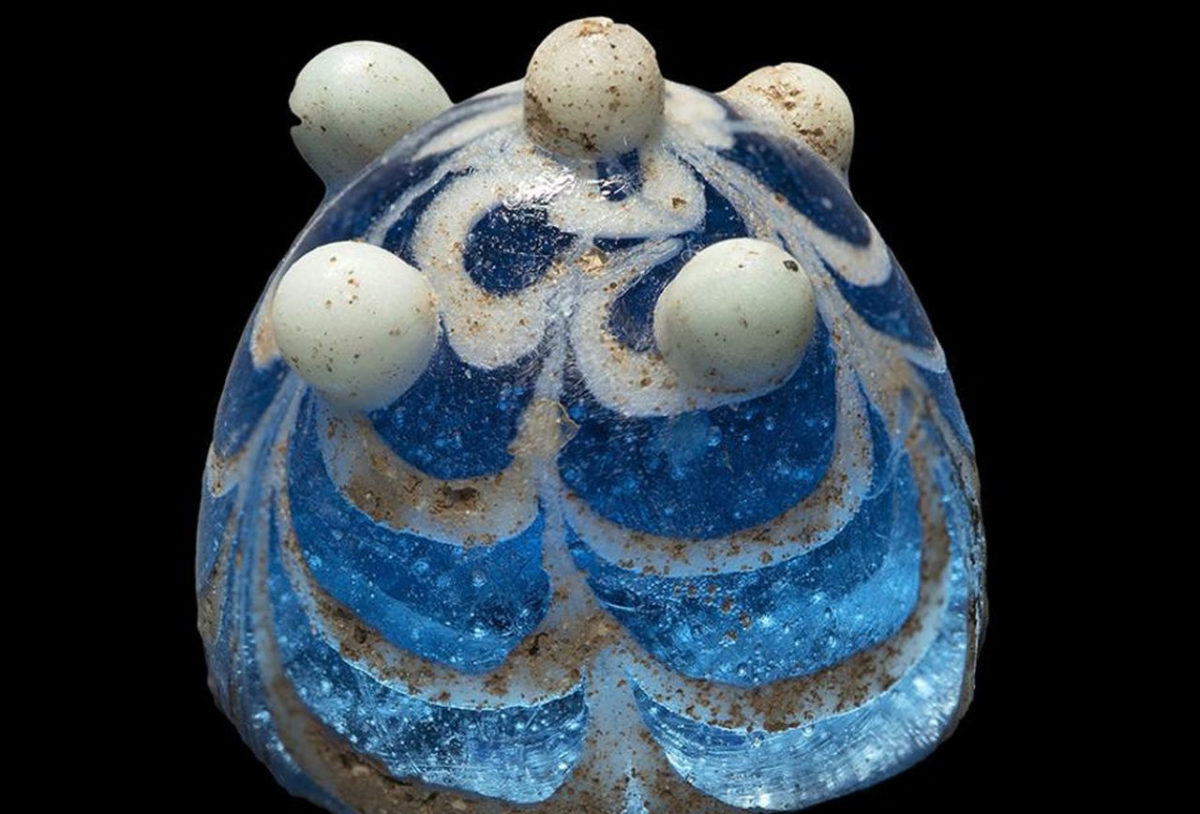 This is thought to be a 'King' piece from a Viking board game hnefatafl.  