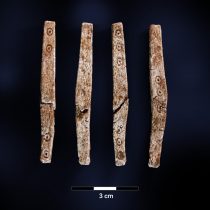Roman Iron Age gaming pieces found in Norwegian Cairn