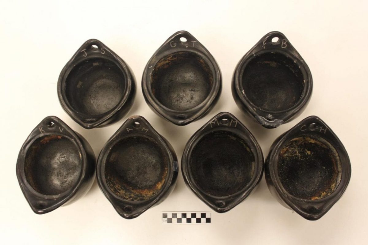 The residue in these seven La Chamba pots retained evidence of all the meals prepared in them. (Photo courtesy of Melanie Miller)