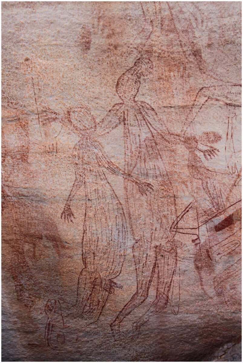 Large male Maliwawa human figures from an Awunbarna site. The largest male is 1.15 metres wide by 1.95 metres high. Credit: P. Tac¸on