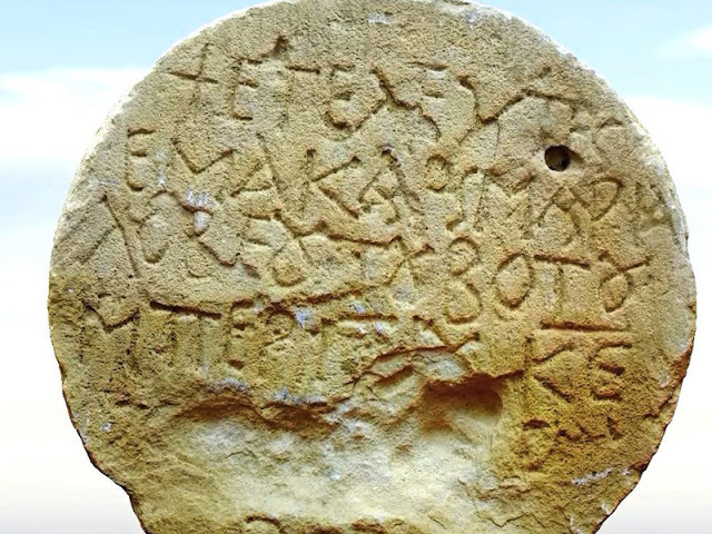 The Byzantine period tombstone with the inscription in Greek. Credit: Emil Aladjem, Israel Antiquities Authority